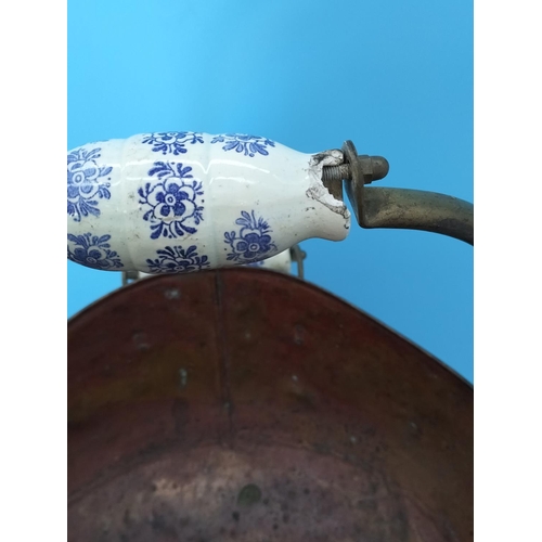 38 - Vintage Copper Helmet Coal Scuttle with Delft Porcelain Handles. 33cm High x 45cm. One Handle A/F.