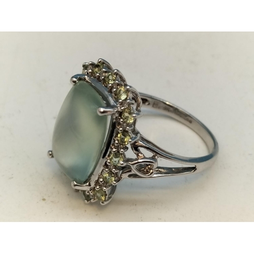 6 - 9ct Gold (QVC 375) Ring with Green Topaz Centre Stone Edged with Cubic Zirconia. Size P. Total Weigh... 