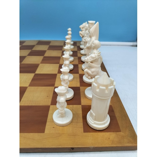 63 - Weighted Plastic Medieval Chess Set plus Folding Wooden Chess Board. Tallest Piece 10cm.