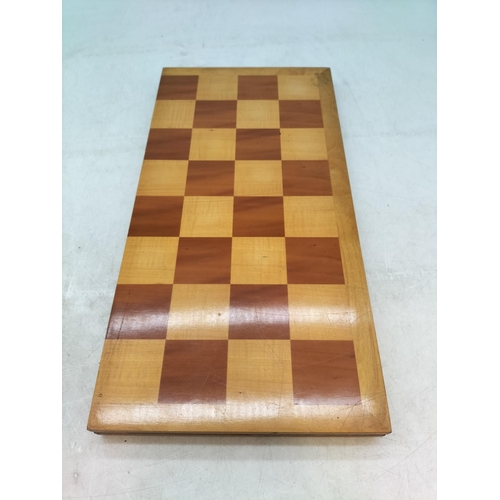 63 - Weighted Plastic Medieval Chess Set plus Folding Wooden Chess Board. Tallest Piece 10cm.