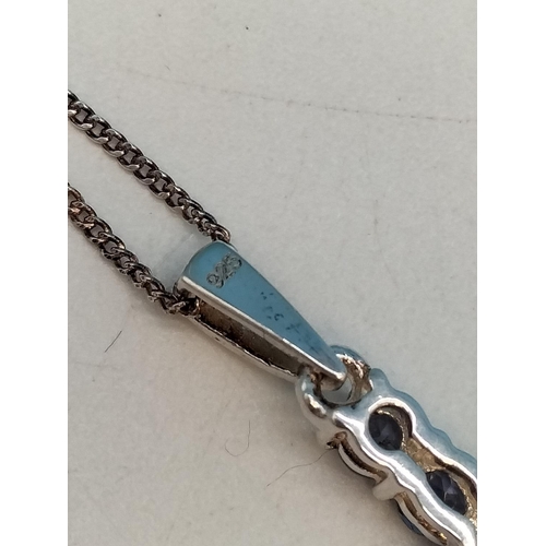 193 - 925 Silver Cross set with Purple Stones on 18