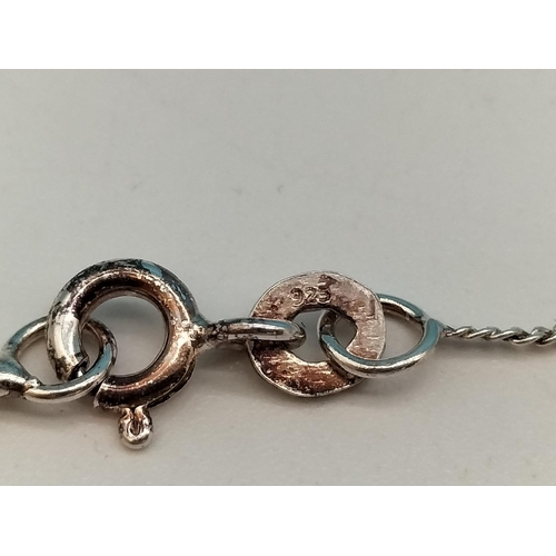 193 - 925 Silver Cross set with Purple Stones on 18