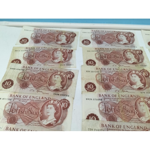 103 - Collection of Bank Notes to include 19 x Bank of England Ten Shilling Notes, 3 x Australian One Doll... 