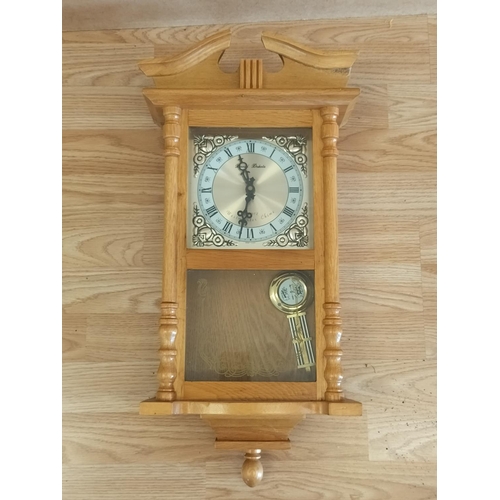 542 - Daniel Dakota Westminster Chime Wall Clock. 58cm x 26cm x 11cm.