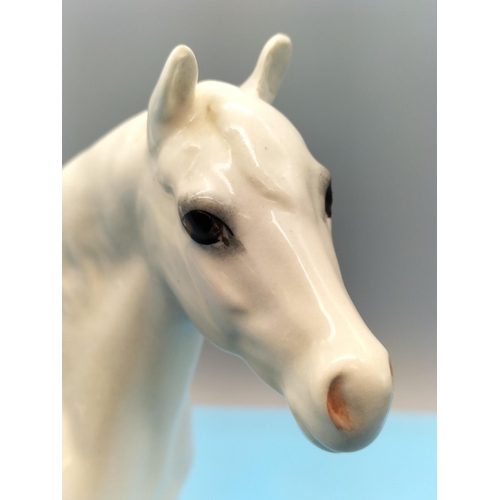 307 - Beswick Figure of a Dapple Grey Horse. 17cm High x 22cm. Very Small Nip to One Ear