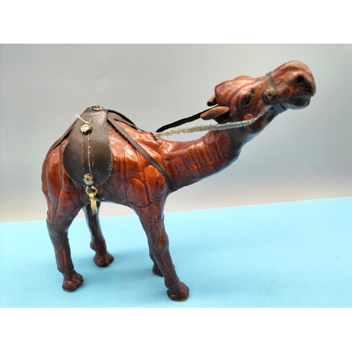 392 - 3 x Leather Camels. Largest 18cm High x 23cm.