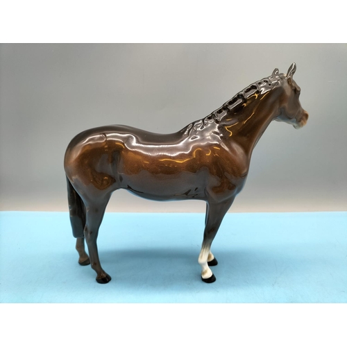 396 - Beswick Figure of a Brown Horse. 20cm High x 24cm. Small Chip to Front Hoof.