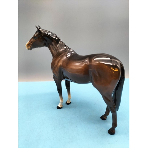 396 - Beswick Figure of a Brown Horse. 20cm High x 24cm. Small Chip to Front Hoof.