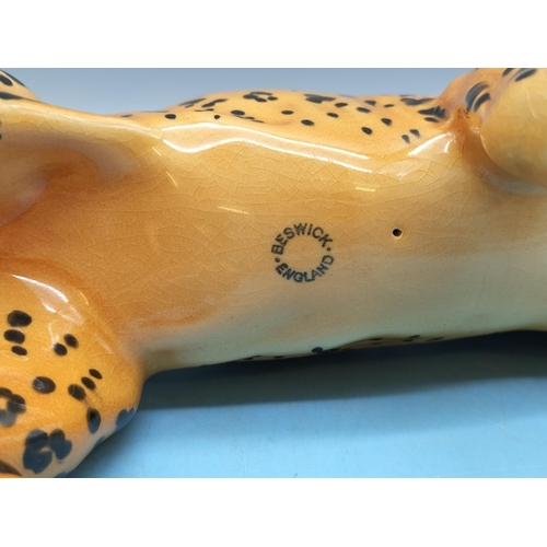 56 - Beswick Figure of a Leopard 1082. 11cm x 30cm.