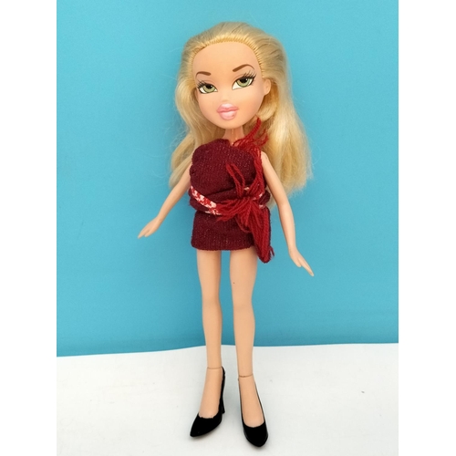 76 - Bratz Dolls (3) to include 'Phoebe Good Girl' and her Twin 'Roxxi' plus One Other.