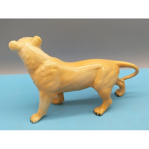 77 - Beswick Figure of a Lioness 2097. 13cm x 22cm.