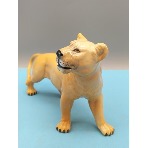 77 - Beswick Figure of a Lioness 2097. 13cm x 22cm.