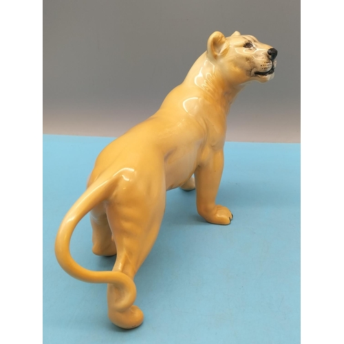 77 - Beswick Figure of a Lioness 2097. 13cm x 22cm.