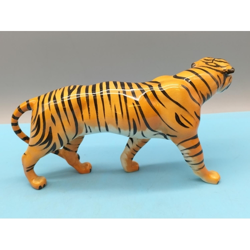 86 - Beswick Small Figure of a Tiger. 10cm x 21cm.