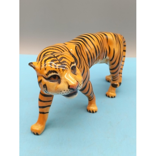 86 - Beswick Small Figure of a Tiger. 10cm x 21cm.