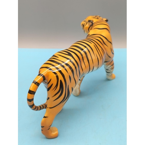 86 - Beswick Small Figure of a Tiger. 10cm x 21cm.