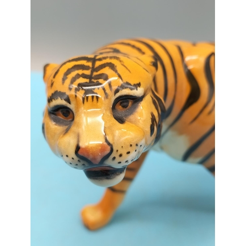 86 - Beswick Small Figure of a Tiger. 10cm x 21cm.