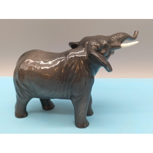 89 - Beswick Small Figure of an Elephant. 12cm High, 19cm Long.
