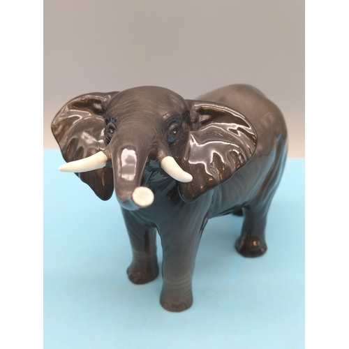 89 - Beswick Small Figure of an Elephant. 12cm High, 19cm Long.