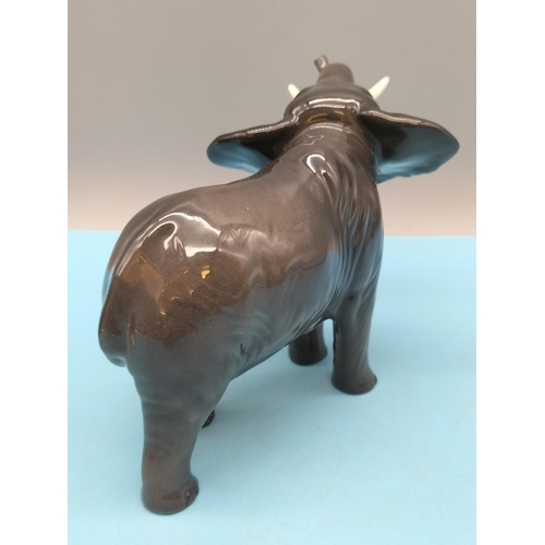 89 - Beswick Small Figure of an Elephant. 12cm High, 19cm Long.
