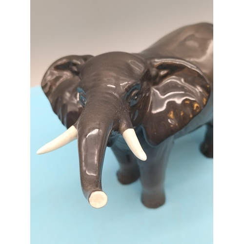 89 - Beswick Small Figure of an Elephant. 12cm High, 19cm Long.