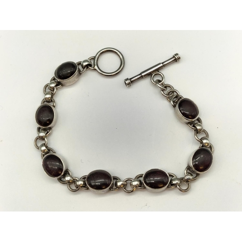 209 - Silver 925 Red Stone 7