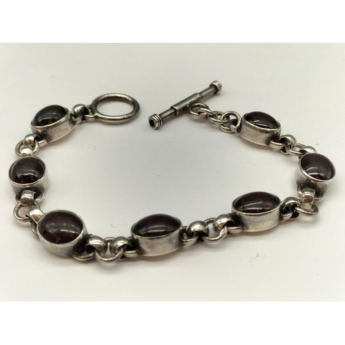 209 - Silver 925 Red Stone 7