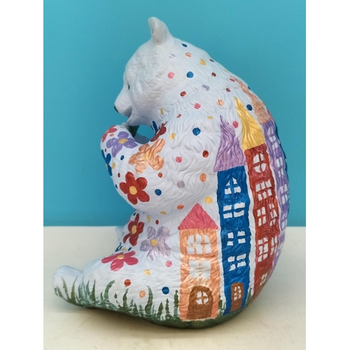 40 - Unusual Hand Painted Bear with Flower and House Design. 21cm Tall. Marked Sam April 2020.