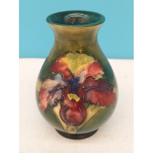 49 - Moorcroft 9cm Vase in the 'Orchid' Pattern on Green Ground.