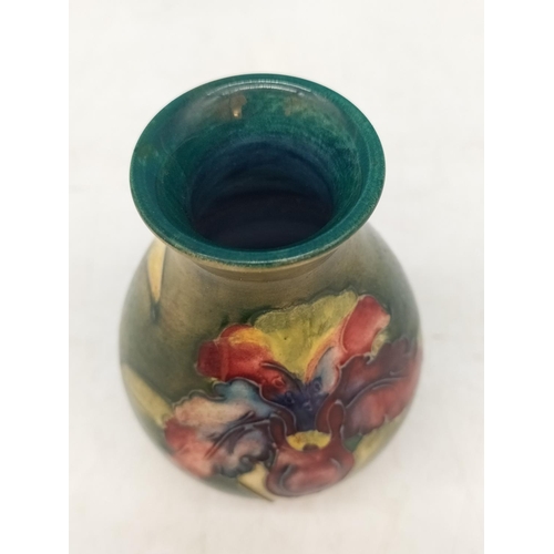 49 - Moorcroft 9cm Vase in the 'Orchid' Pattern on Green Ground.