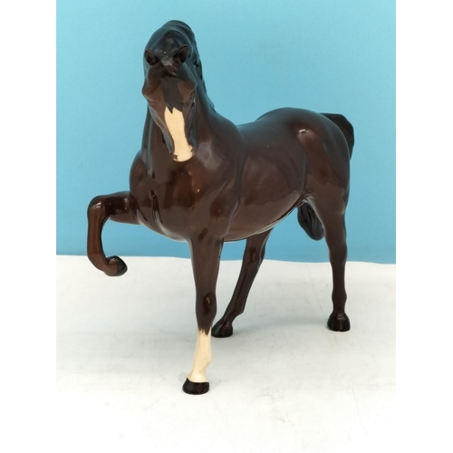 136 - Royal Doulton Prancing Horse Figure. 19cm High x 21cm. A/F Nip to Hoof.