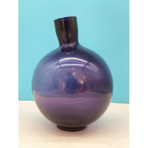 171 - Sia Collection Poseable Art Glass Purple Bottle Vase on Rubber Ring Stand. 24cm High, 17cm Diameter.