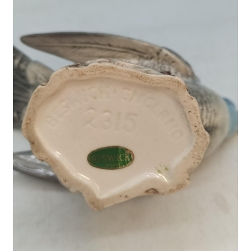 69 - Beswick Figure of a Cuckoo Bird, Model 2315. 12cm High, 19cm x 18cm.