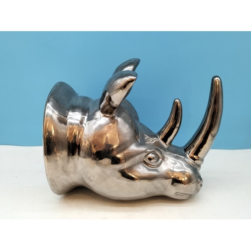 139 - Silver Tone Wall Mounted Rhinocerous Head. 30cm x 25cm.