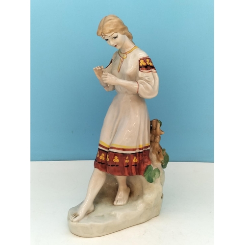 106 - Vintage 1960's Polonnoe Figure of a Girl with Flower. 31cm Tall.