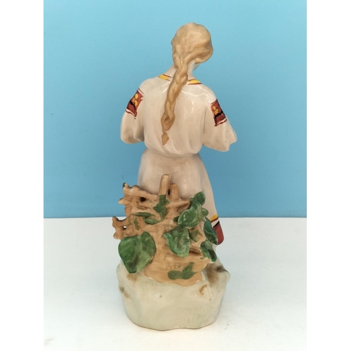 106 - Vintage 1960's Polonnoe Figure of a Girl with Flower. 31cm Tall.