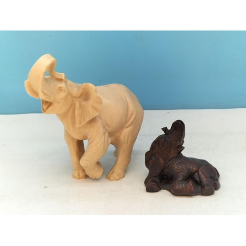 72 - Resin Elephant Figures (2). Largest 19.5cm High, 18cm x 10cm.