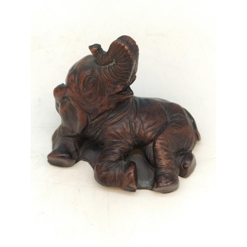 72 - Resin Elephant Figures (2). Largest 19.5cm High, 18cm x 10cm.