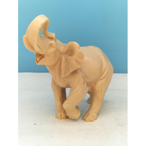 72 - Resin Elephant Figures (2). Largest 19.5cm High, 18cm x 10cm.