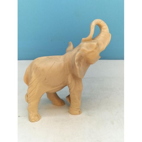 72 - Resin Elephant Figures (2). Largest 19.5cm High, 18cm x 10cm.