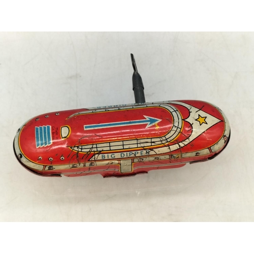 92 - Tin Plate Big Dipper Wind Up Toy. Requires Attention. 12cm Long.