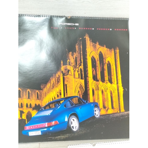 216 - Vintage Porsche Calendars (3) 1992, 1993 and 1997 plus Porsche Medallion/Coin.