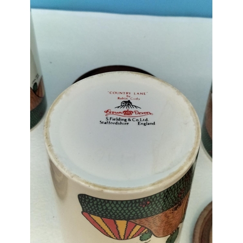 189 - Crown Devon 'Country Lane' By Robin Cody Coffee Tea and Sugar (A/F) Lidded Canisters. 16cm High.