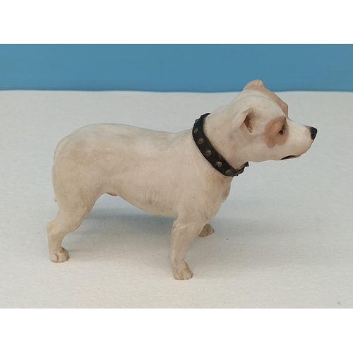 215 - North Light Figure of a Staffordshire Bull Terrier. 11.5cm High x 15cm.