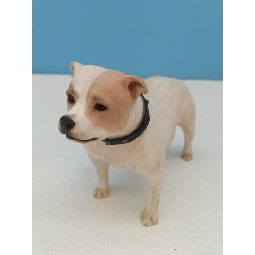 215 - North Light Figure of a Staffordshire Bull Terrier. 11.5cm High x 15cm.