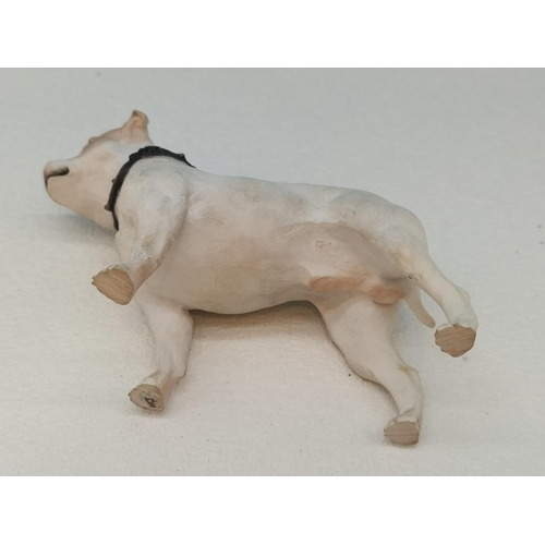 215 - North Light Figure of a Staffordshire Bull Terrier. 11.5cm High x 15cm.