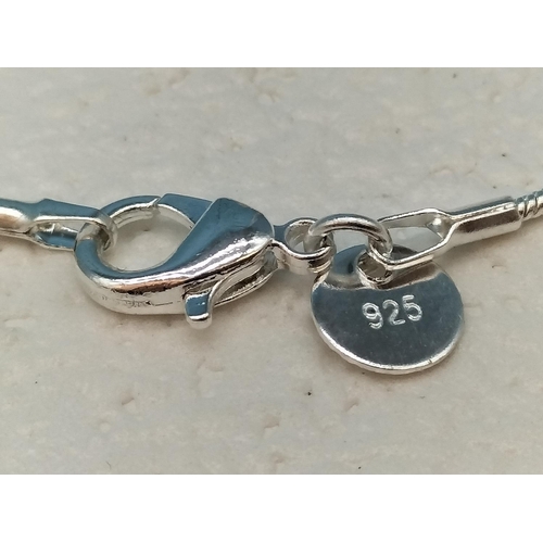 429 - 925 Tagged Necklace with Enameled Shell Pendant with 925 Silver Mount. 5cm Diameter. Boxed.