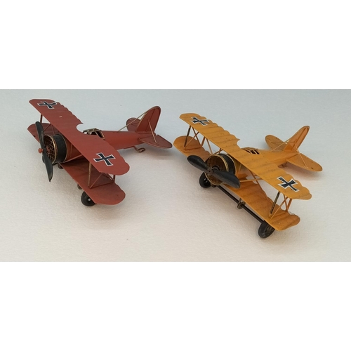 465 - Tin War Planes (2). 10cm High, 20cm x 22cm.