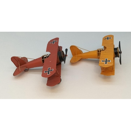 465 - Tin War Planes (2). 10cm High, 20cm x 22cm.