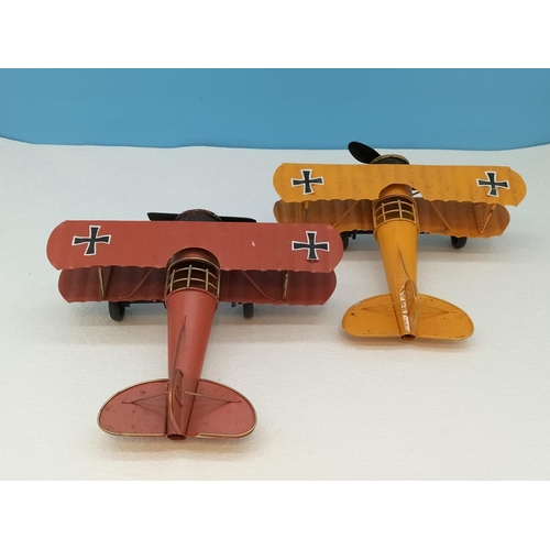 465 - Tin War Planes (2). 10cm High, 20cm x 22cm.